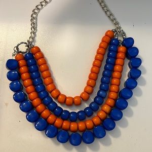 Orange and blue 4 layered bead  necklace  and earrings to match.